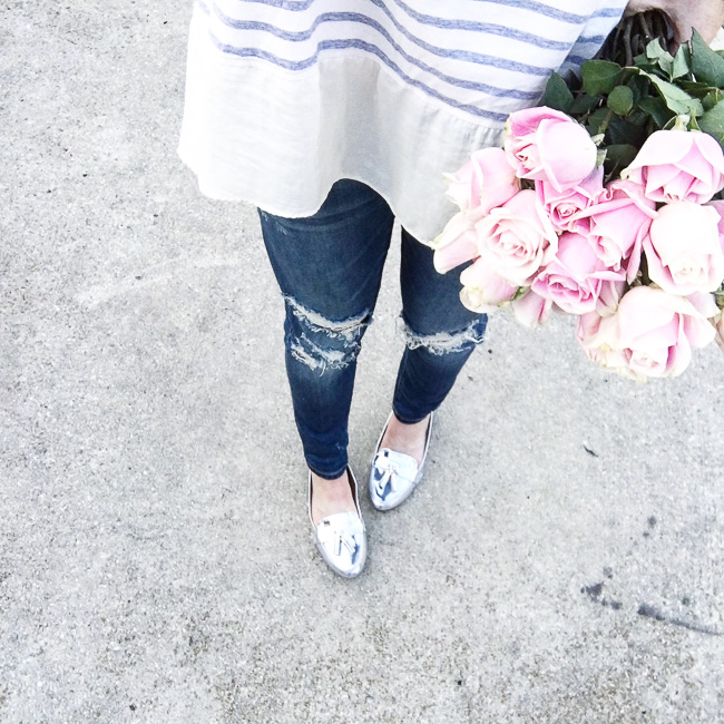 striped top, distressed jeans, silver loafers, silver flats, pink roses, casual spring outfit