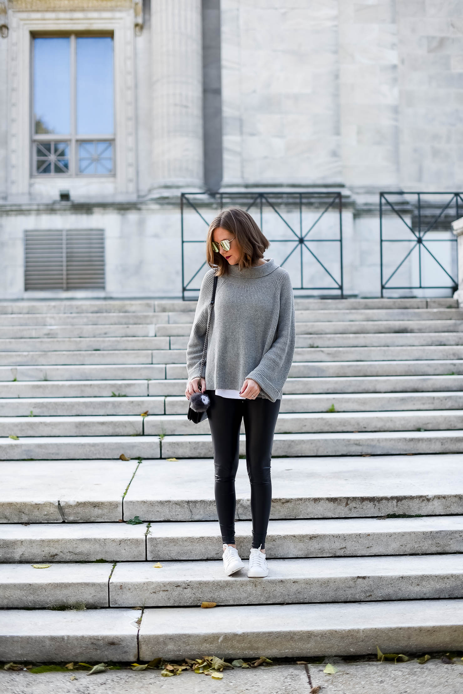 the cutest star sneakers for under $30 cozy and edgy outfit the best faux leather leggings its in the details monochromatic outfit