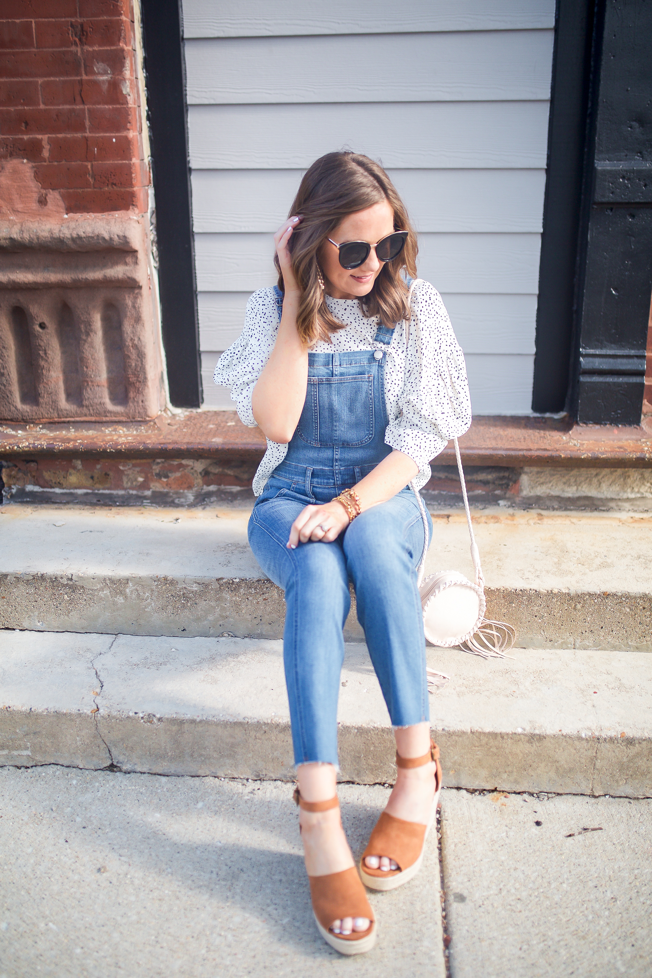 anyone can wear overalls, how to dress up overalls, skinny overalls and a bloused top, polka dot blouse, overalls that flatter every body type