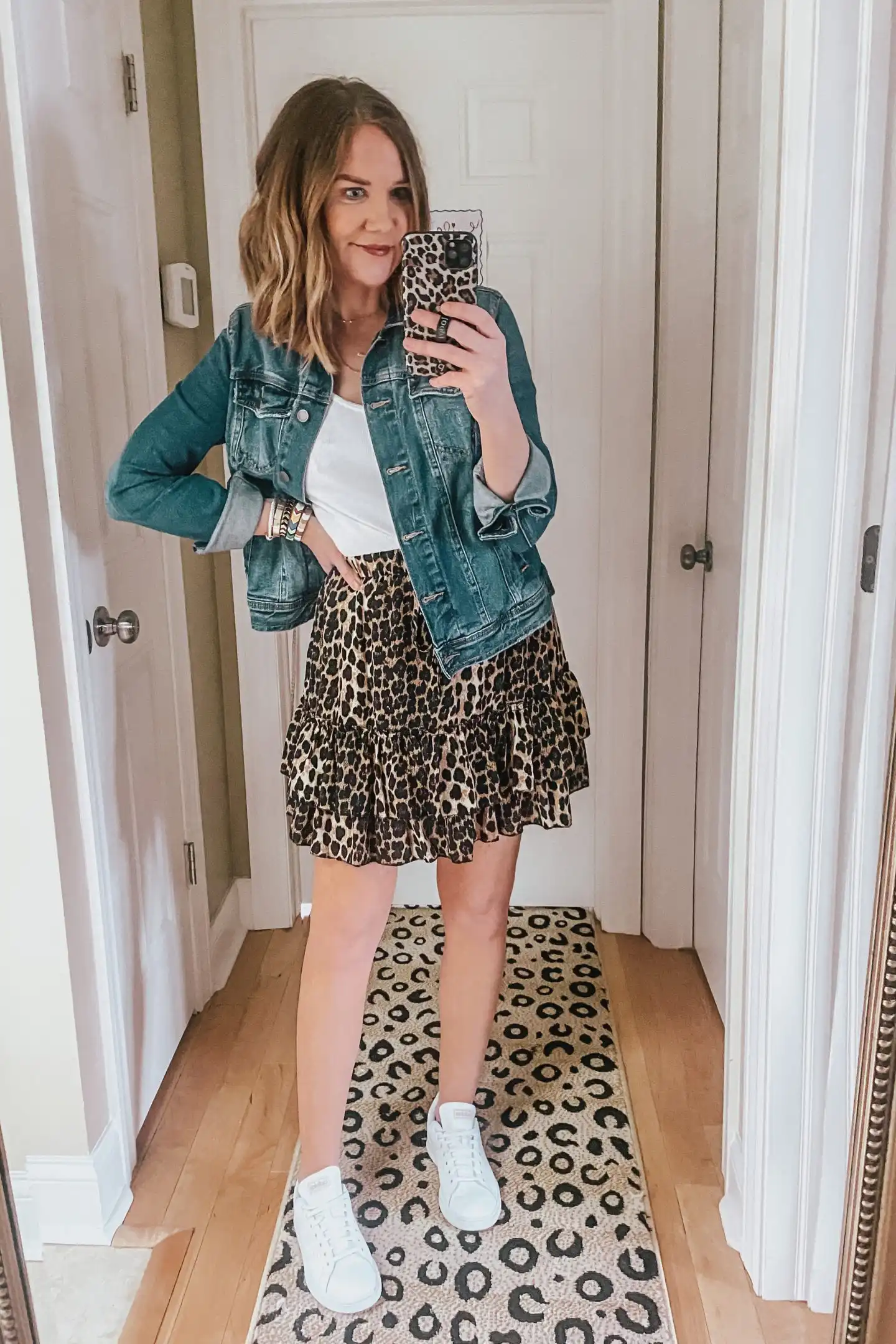 how to style white sneakers with a skirt